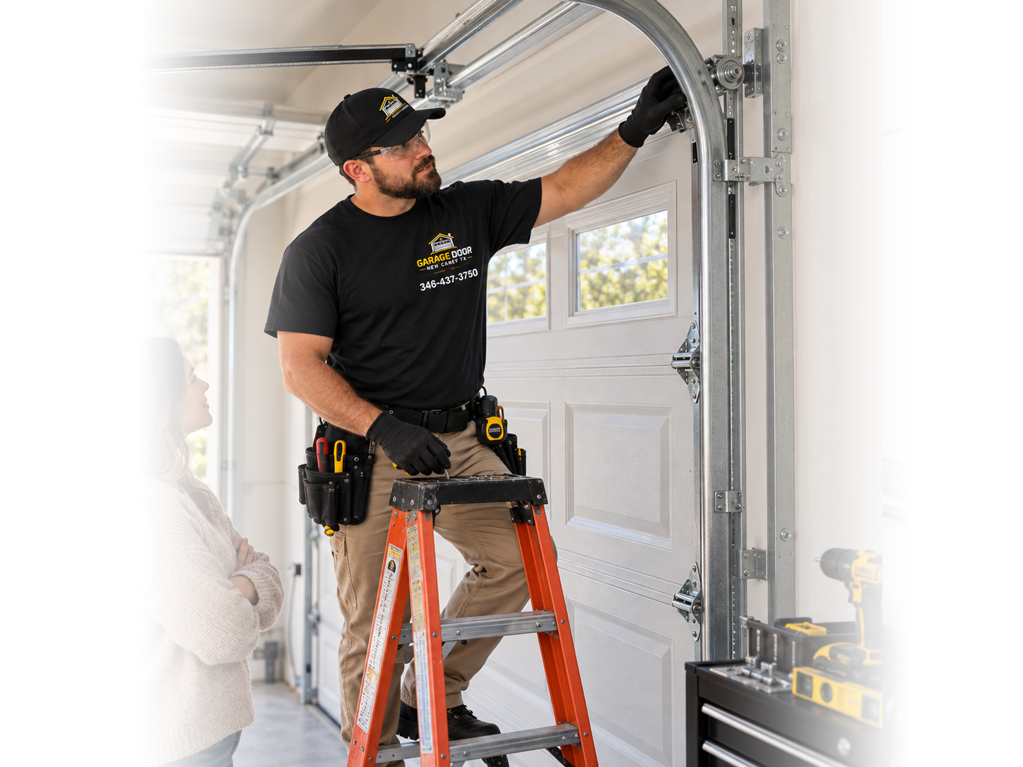 Technician performing garage door opener repair in New Caney TX